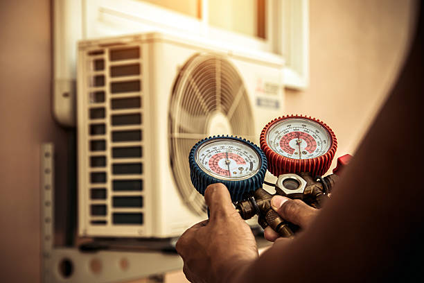 Professional Air Conditioning Service technician working in New Oxford, PA